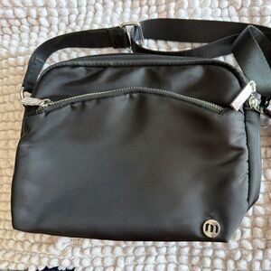 Black Crossbody Bag with Silver Accents. Great for travel.